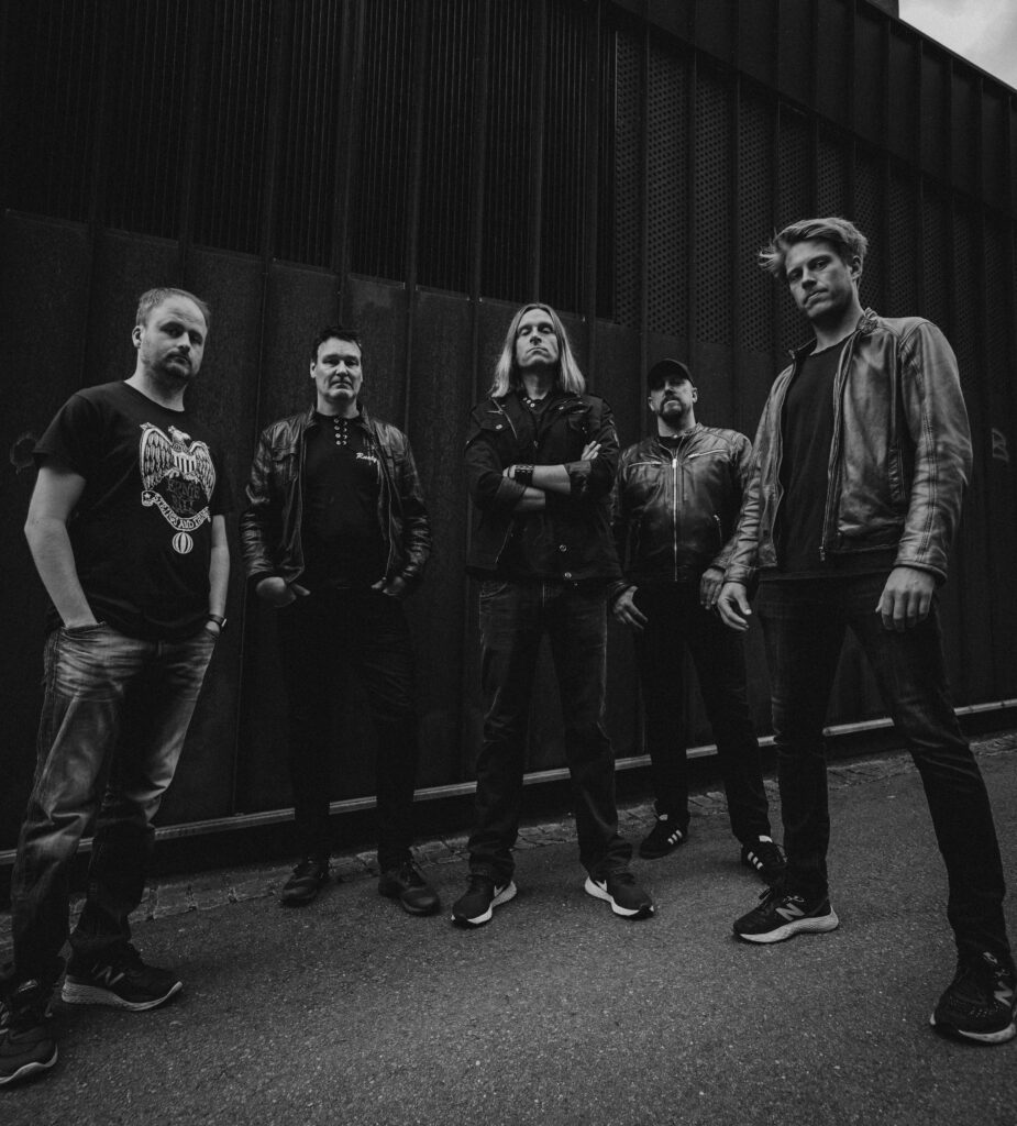 Sinister King Band Photo Sinister King band photo. From left to right: Yngve Knudsen, bass - Jostein Uthaug, guitar - Rune Skjønberg, vocals - Frode Andreassen, drums - Ole Henrik Vik, synth.